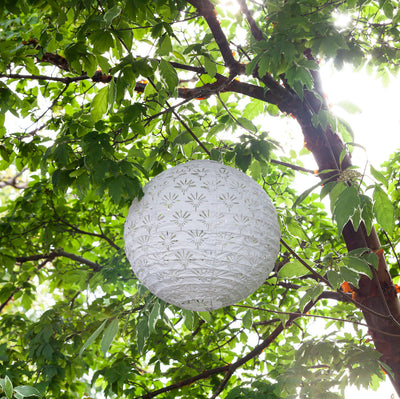 Soji Stella Deco Globe Tyvek Solar Lantern outside