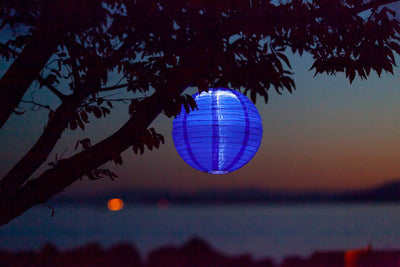 Cerulean Blue Soji Festival Solar Lantern glowing at night