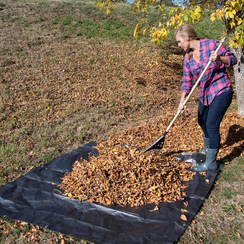 Clean Up Canvas raking leaves onto tarp