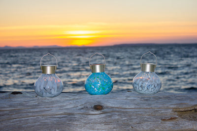 Tea Lantern Handlown Solar Glass at sunset