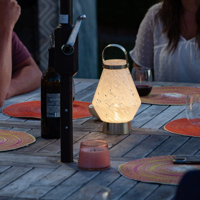 Lightkeeper USB rechargable handblown glass lantern on table