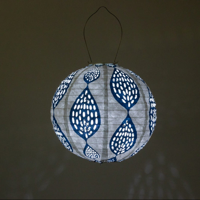 Soji Stella Printed Solar Lantern glowing