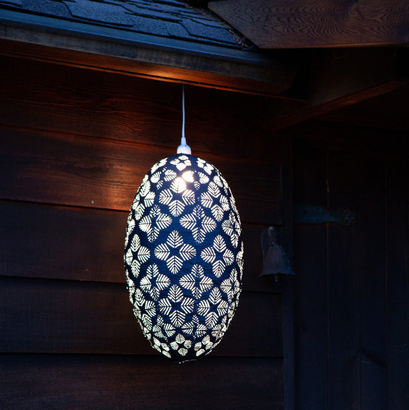 Soji Stella Nova Palm Pod Indoor Outdoor Tyvek Pendant Lamp outside cabin
