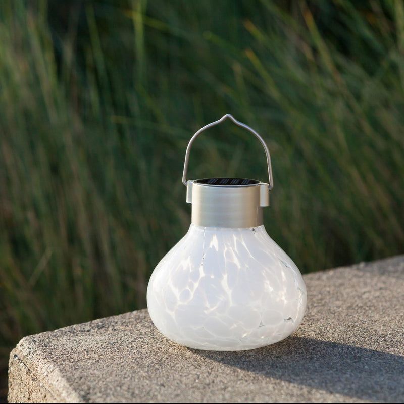 Tea Lantern Handlown Solar Glass  on patio