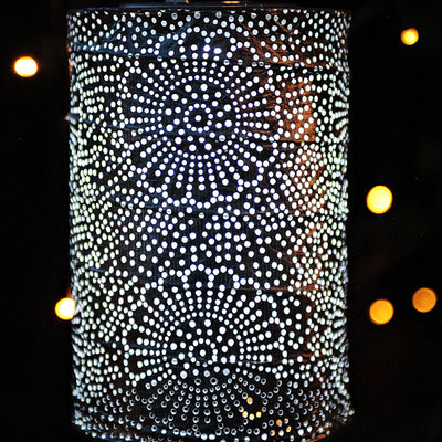 Soji Stella Cylinder Tyvek Solar Lantern  glowing at night close up